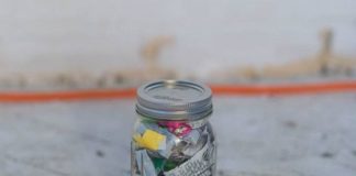 four years of trash in a mason jar