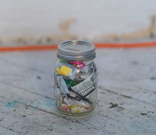 four years of trash in a mason jar